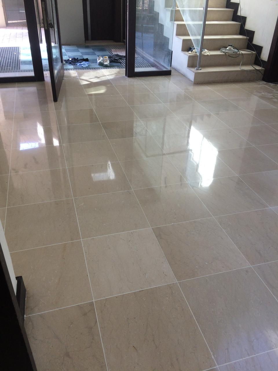 Marble tile surface prepared for scratch and stain removal